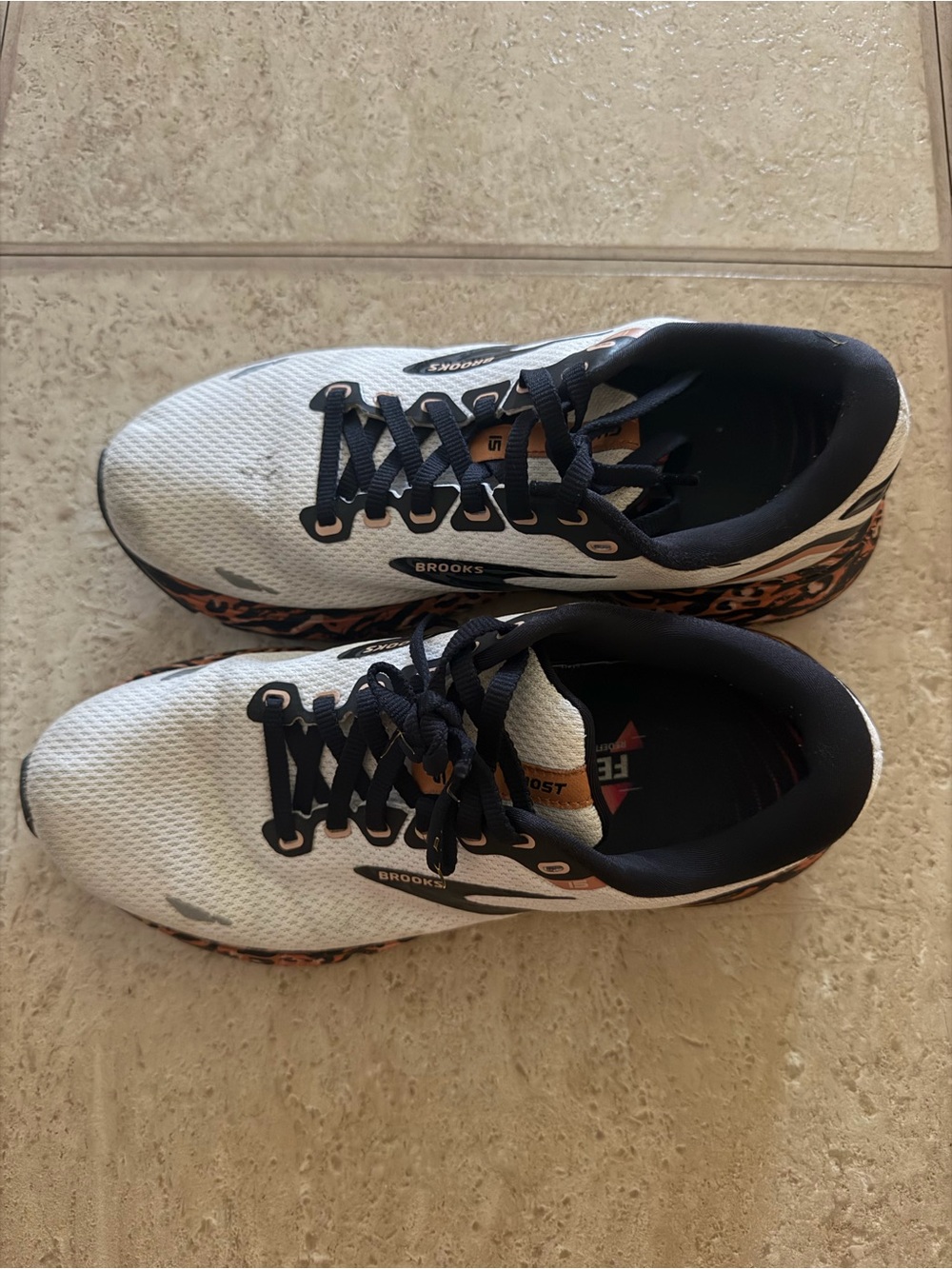 Brooks White & Black Running Shoes with Orange Accents